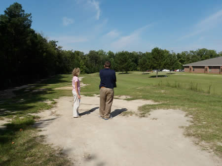 Project Partners evaluate a site in Smiths Station